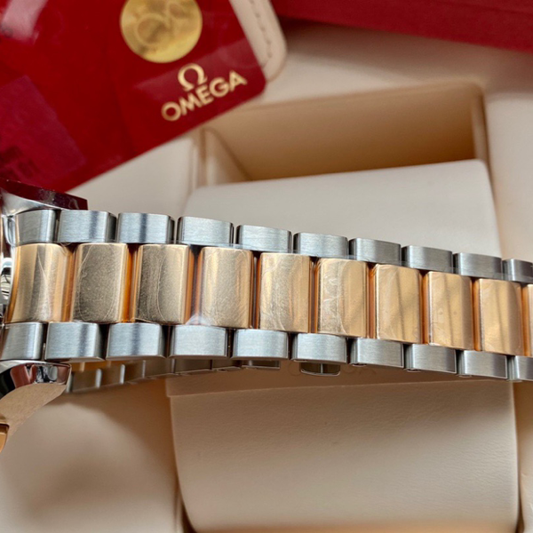 欧米茄海马18k间金at9605同轴计时机芯灰面熊猫眼表径43mm原膜未撕工